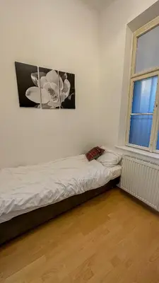 Ein Bett oder Betten in einem Zimmer der Unterkunft Garden-Eden Apartment