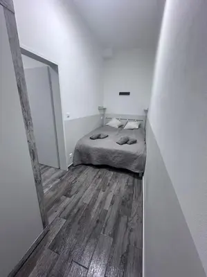Ein Bett oder Betten in einem Zimmer der Unterkunft Cozy Homes Vienna