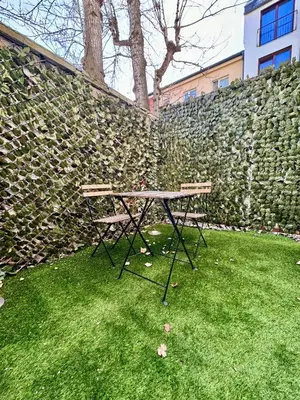 Ein Garten an der Unterkunft Möbliertes Apartment mit Terrasse