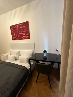 Ein Bett oder Betten in einem Zimmer der Unterkunft DATRI Petite Suite 1 - 3