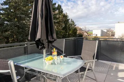 Ein Balkon oder eine Terrasse in der Unterkunft NobleNest: Terrasse - Netflix - Kaffee