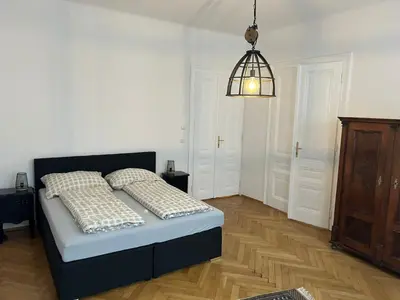 Ein Bett oder Betten in einem Zimmer der Unterkunft Paky Appartements 00406