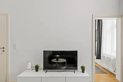 TV/Unterhaltungsangebot in der Unterkunft Modern Apartment near City Center 1BR