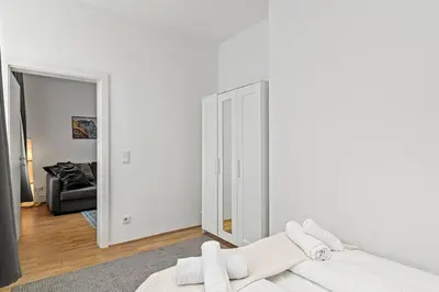 Ein Bett oder Betten in einem Zimmer der Unterkunft Modern Apartment near City Center 1BR
