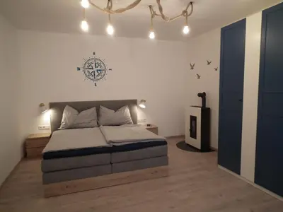 Ein Bett oder Betten in einem Zimmer der Unterkunft Appartement blue Dinghi
