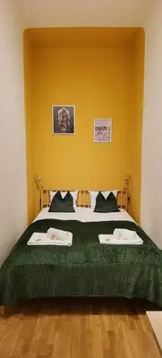 Ein Bett oder Betten in einem Zimmer der Unterkunft Amarilis - Dolce Duo Homes