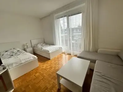 Ein Bett oder Betten in einem Zimmer der Unterkunft Neugebäudestrasse