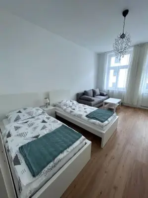 Ein Bett oder Betten in einem Zimmer der Unterkunft Herzgasse