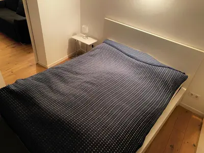 Ein Bett oder Betten in einem Zimmer der Unterkunft Apartment in Grinzing bis zu 4 Personen