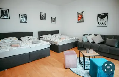 Ein Bett oder Betten in einem Zimmer der Unterkunft Raimond Apartment Top 27