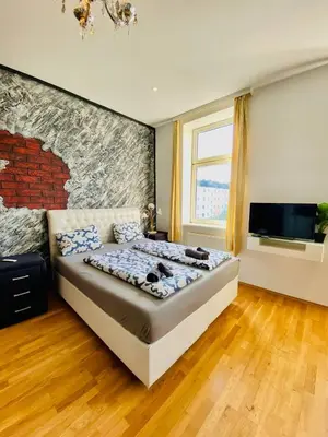 Ein Bett oder Betten in einem Zimmer der Unterkunft W Apartment - Brigittenau Area MM28