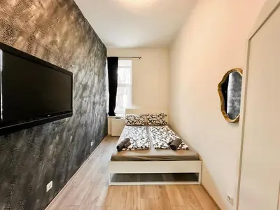 Ein Bett oder Betten in einem Zimmer der Unterkunft W Apartment - Brigittenau Area MM7