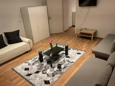 Ein Sitzbereich in der Unterkunft Palace Apartment