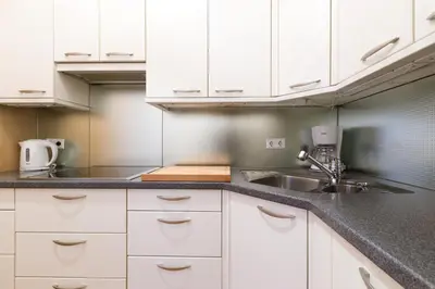 Küche/Küchenzeile in der Unterkunft HeyMi Apartments Oper