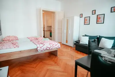 Ein Bett oder Betten in einem Zimmer der Unterkunft Raimond Apartment Top 12