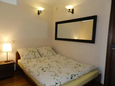 Ein Bett oder Betten in einem Zimmer der Unterkunft Wile West Apartments