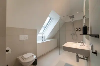 Ein Badezimmer in der Unterkunft josef's home I Penthouse I Balcony & City Views
