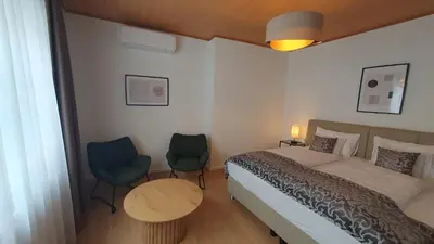 Ein Bett oder Betten in einem Zimmer der Unterkunft Zentrum 7 Mörbisch