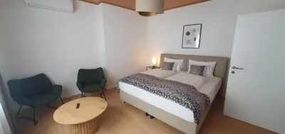 Ein Bett oder Betten in einem Zimmer der Unterkunft Zentrum 7 Mörbisch