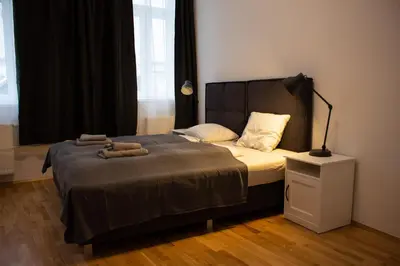 Ein Bett oder Betten in einem Zimmer der Unterkunft Klimt Apartments