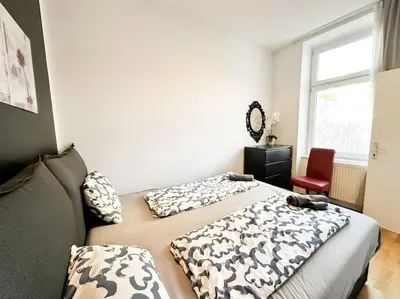 Ein Bett oder Betten in einem Zimmer der Unterkunft W Apartment - Brigittenau Area MM29