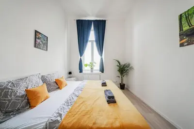 Ein Bett oder Betten in einem Zimmer der Unterkunft 75 m² near Nussdorferstrasse U6