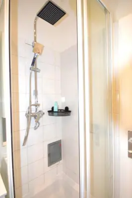 Ein Badezimmer in der Unterkunft Cozy Apartments in Central Location with Free Parking