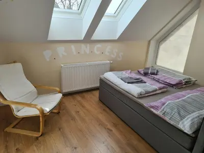 Ein Bett oder Betten in einem Zimmer der Unterkunft GardenLoft no 6