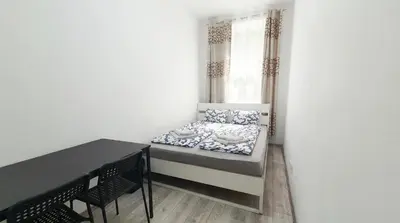 Ein Bett oder Betten in einem Zimmer der Unterkunft 15 Min to Vienna Center - Affordable & Simple 5BR Apt with WIFI