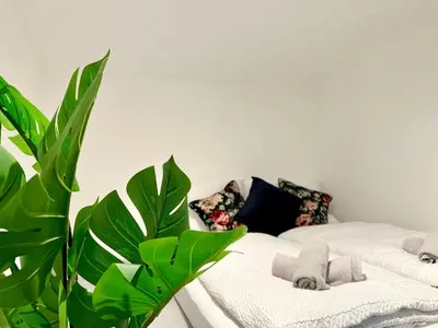 Ein Bett oder Betten in einem Zimmer der Unterkunft City Apartment, central, 2 min to U4 Margaretengürtel