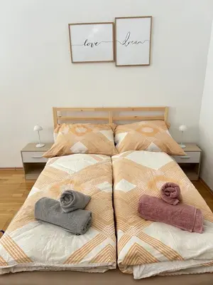 Ein Bett oder Betten in einem Zimmer der Unterkunft Top Location