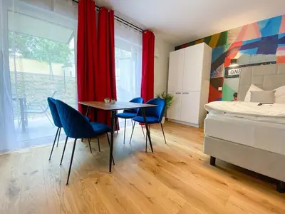 Ein Bett oder Betten in einem Zimmer der Unterkunft Großzügige Wohnung mit Terrasse
