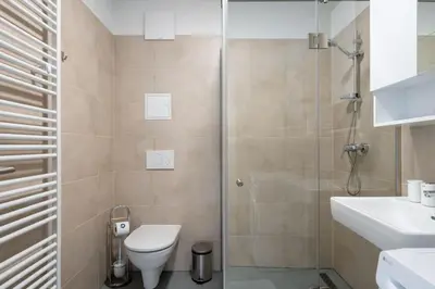 Ein Badezimmer in der Unterkunft Elegant 1BR Flat with Balcony by HM