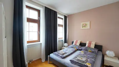 Ein Bett oder Betten in einem Zimmer der Unterkunft CozyNite Premium Apartment Hernals 2