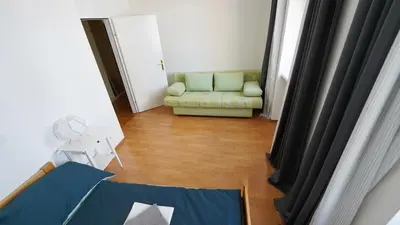 Ein Sitzbereich in der Unterkunft CozyNite Premium Apartment Hernals 2