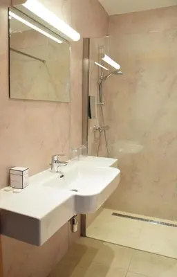 Ein Badezimmer in der Unterkunft Appartmenthaus Rosenhof