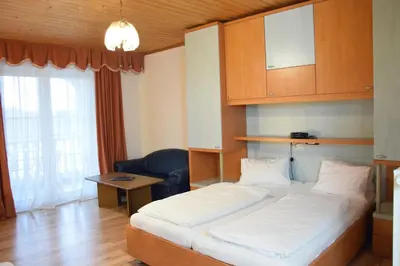 Ein Bett oder Betten in einem Zimmer der Unterkunft Appartmenthaus Rosenhof
