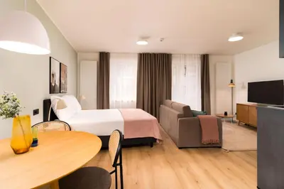 Ein Bett oder Betten in einem Zimmer der Unterkunft Limehome Vienna Favoritenstr