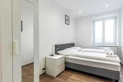 Ein Bett oder Betten in einem Zimmer der Unterkunft CENTRAL HUB close to main station by JR City Apartments