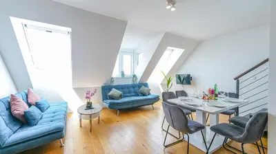Ein Sitzbereich in der Unterkunft Christiano Apartments Hauptbahnhof | contactless check-in