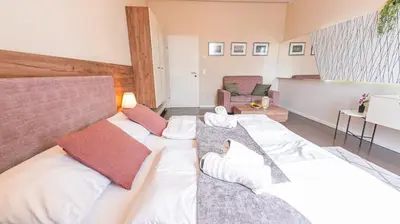 Ein Bett oder Betten in einem Zimmer der Unterkunft Christiano Apartments Hauptbahnhof | contactless check-in