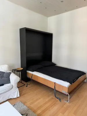 Ein Bett oder Betten in einem Zimmer der Unterkunft Charmante zentral gelegene Wohnung