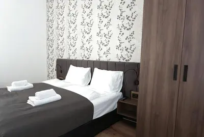 Ein Bett oder Betten in einem Zimmer der Unterkunft Viva La Vienna Apartments