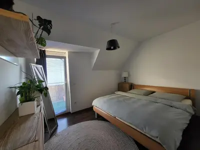 Ein Bett oder Betten in einem Zimmer der Unterkunft Airport Viena Unterkunft