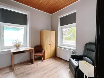 Ein Sitzbereich in der Unterkunft Up Residences