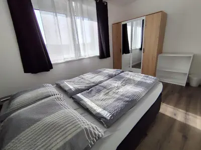 Ein Bett oder Betten in einem Zimmer der Unterkunft Privatunterkunft in Hornstein