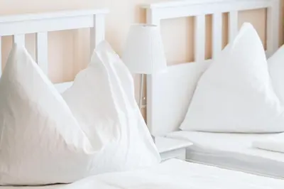 Ein Bett oder Betten in einem Zimmer der Unterkunft Hotel Schönbrunn by Vienna Living Apartments