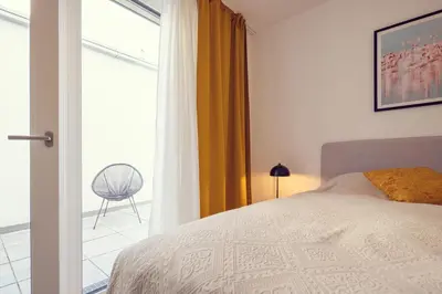 Ein Bett oder Betten in einem Zimmer der Unterkunft MEVERLING Sky 6