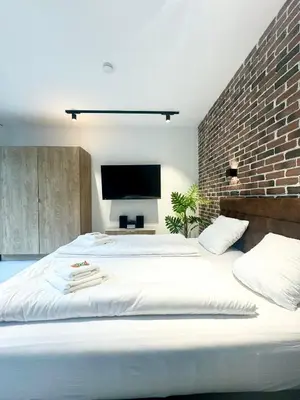 Ein Bett oder Betten in einem Zimmer der Unterkunft Möbliertes Apartment mit Terrasse