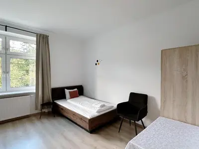 Ein Bett oder Betten in einem Zimmer der Unterkunft Up Resistances G